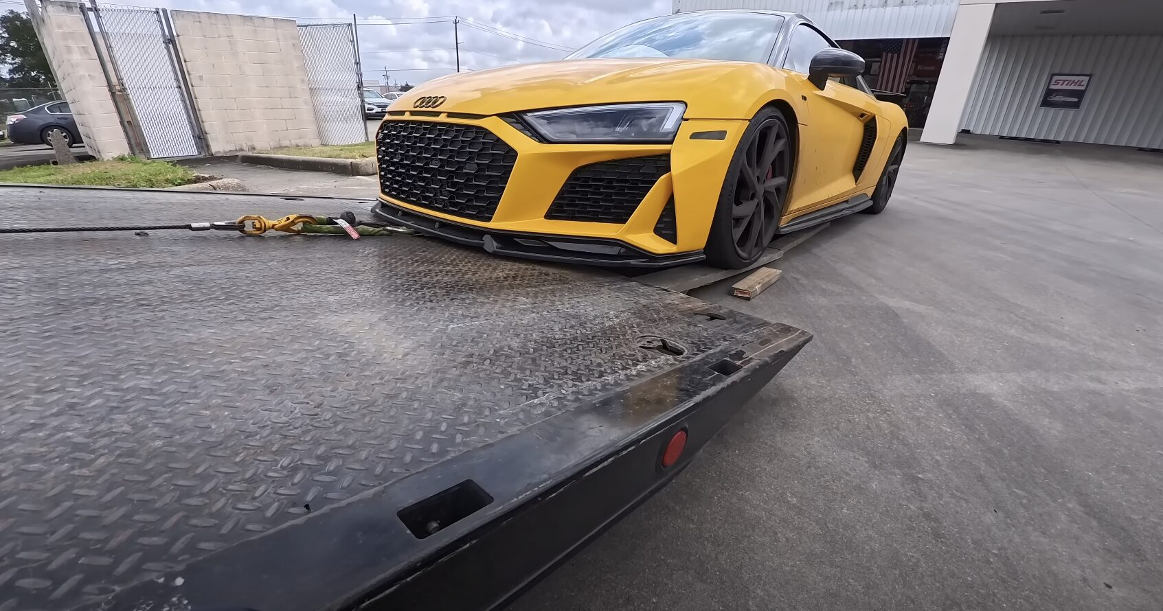 Flatbed towing service for safe vehicle transport in Mission Bend